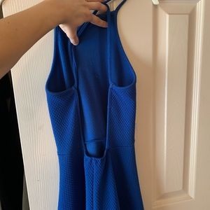 Super cute open back the royal blue dress.